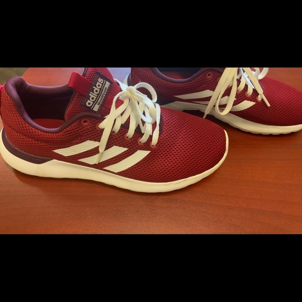 RED AND WHITE ADIDAS US SIZE 7. CLEAN WITH NO MAJOR SCUFFS OR TEARS. SOLD. AS IS
